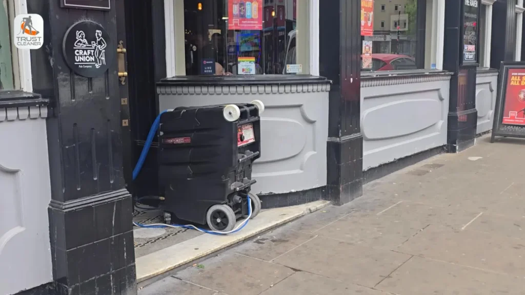 Extraction machine set up outside a pub for carpet cleaning - Trust Cleaner - Carpet & Upholstery Specialists Extraction machine set up outside a pub for carpet cleaning